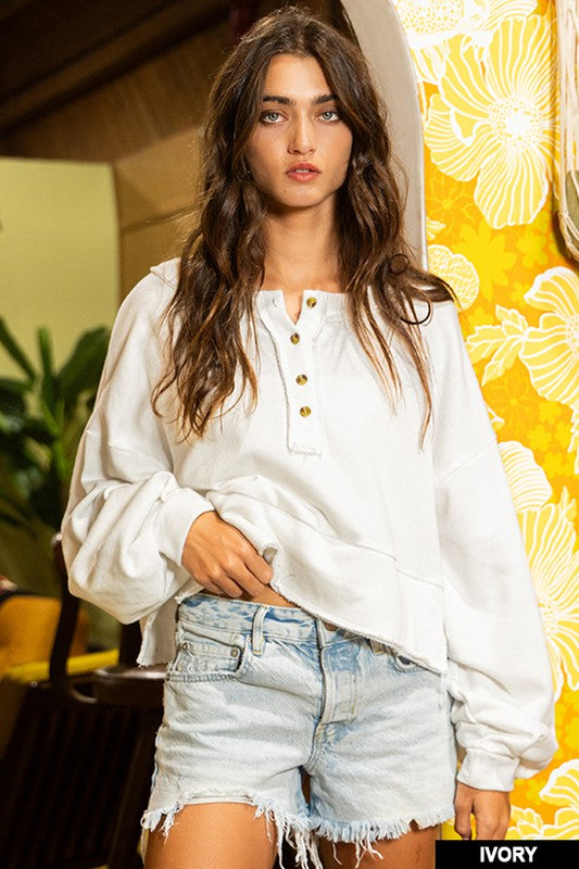 Distressed Long Sleeve Button- Up Cropped Top