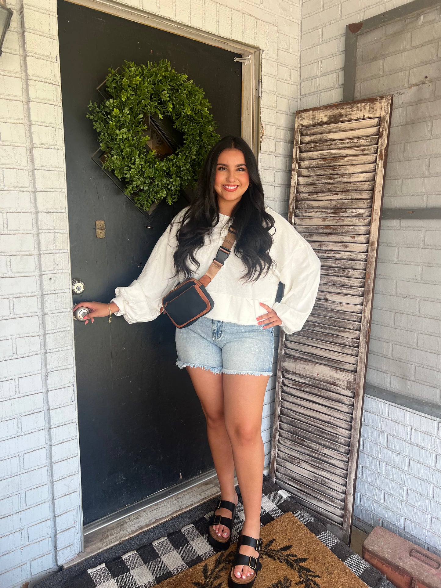 Distressed Long Sleeve Button- Up Cropped Top